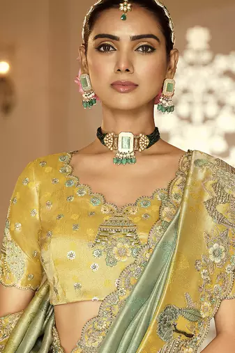 Mint green & mustard yellow silk blend saree with meenakari zari weaving Work