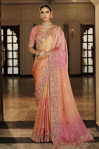 Silk blend saree in peach & rose pink with intricate meenakari zari detailing