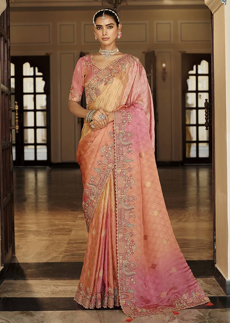 Silk blend saree in peach & rose pink with intricate meenakari zari detailing