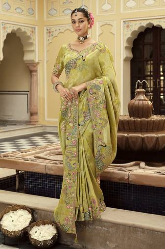 Silk blend silk saree in light green with rich meenakari zari weaving