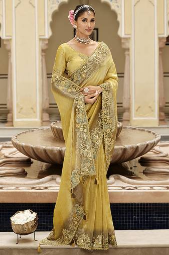 Silk blend silk saree in light yellow with rich meenakari zari weaving