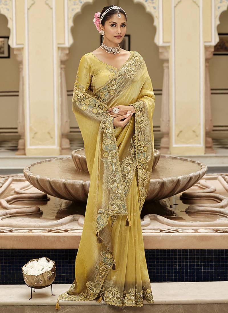 Silk blend silk saree in light yellow with rich meenakari zari weaving