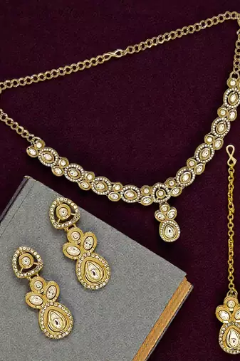 Gold plated kundan polki necklace maang tikka set