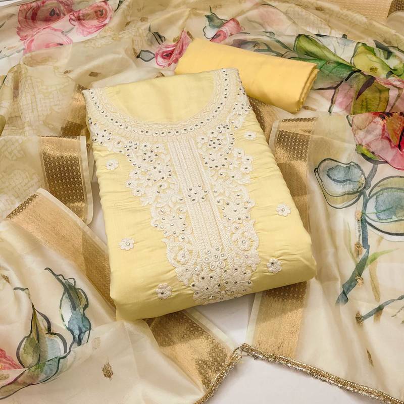 Beige embroidered cotton silk semi stitched churidar dress-materials