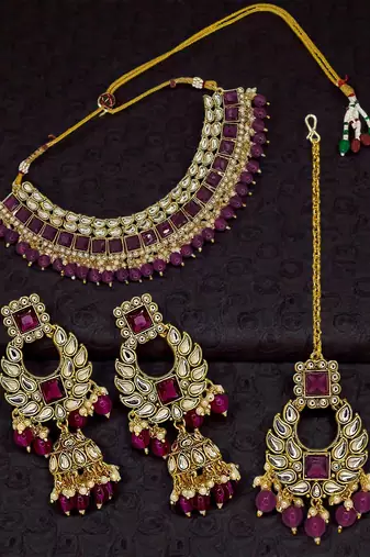 Gold plated kundan wine necklace maang tikka set