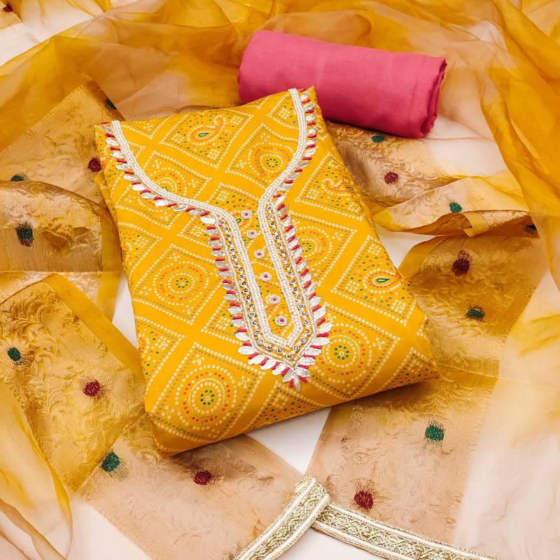 Yellow hand embroidery cotton semi stitched churidar dress-materials
