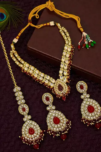 Gold plated kundan maroon double line long  necklace maang tikka set