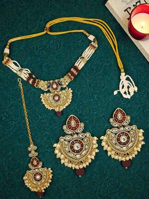Gold plated kundan maroon jadau peacock necklace maang tikka set 1