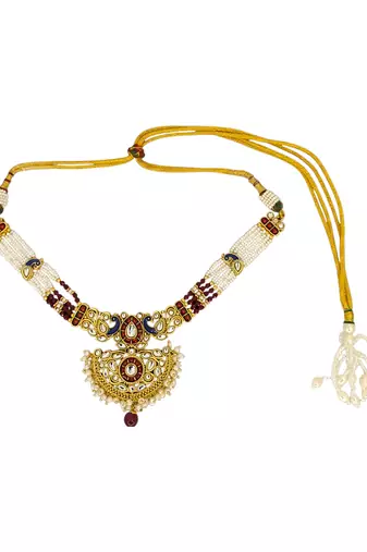 Gold plated kundan maroon jadau peacock necklace maang tikka set