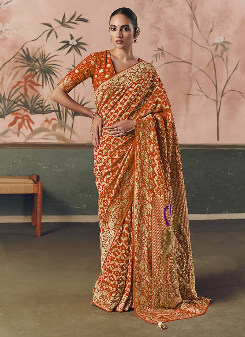 Orange bandhej weaving work faux khaddi georgette saree