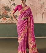 Pink bandhej weaving work faux khaddi georgette saree