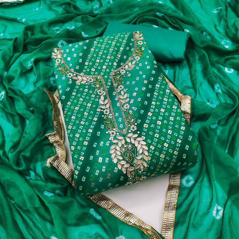 Green hand embroidery cotton semi stitched churidar dress-materials