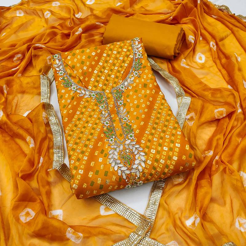 Yellow hand embroidery cotton semi stitched churidar dress-materials