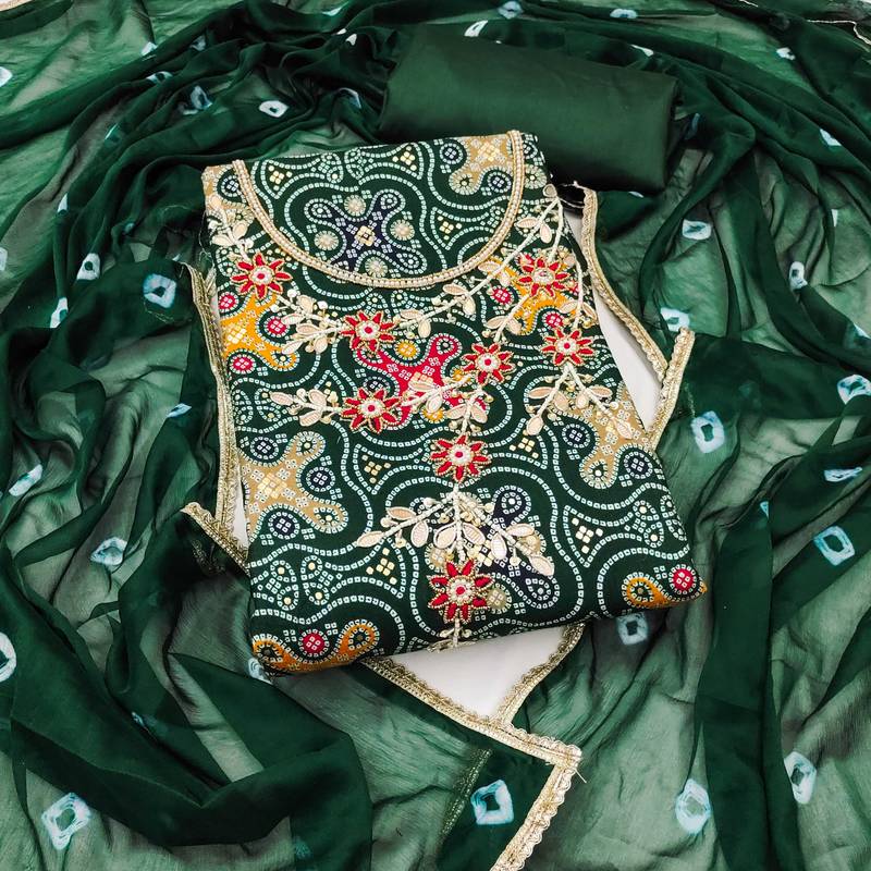 Green hand embroidery cotton semi stitched churidar dress-materials