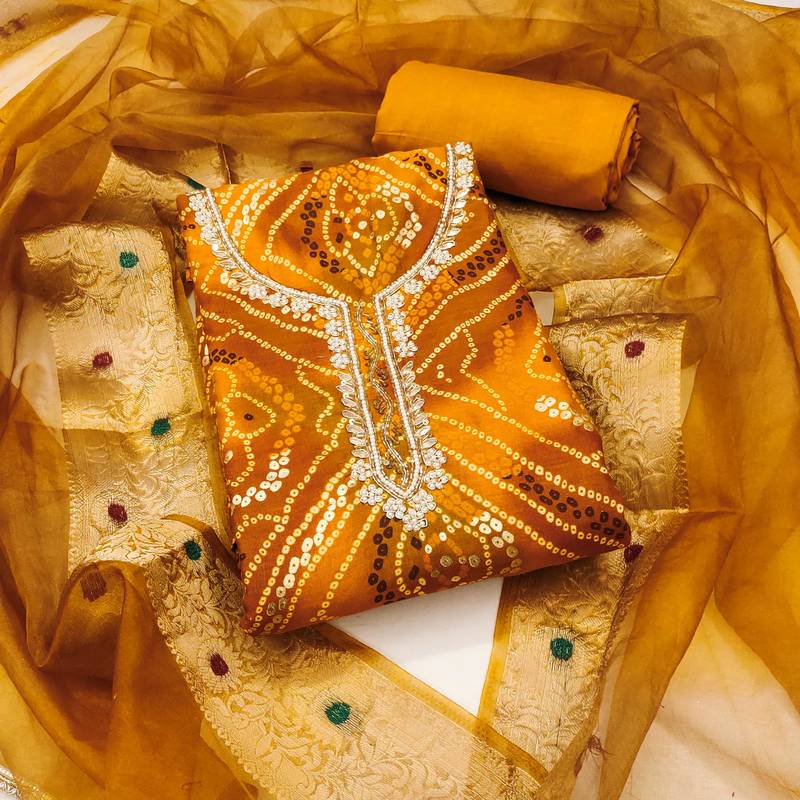 Yellow hand embroidery cotton semi stitched churidar dress-materials