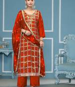 Orange woven cotton silk semi stitched churidar dress-materials