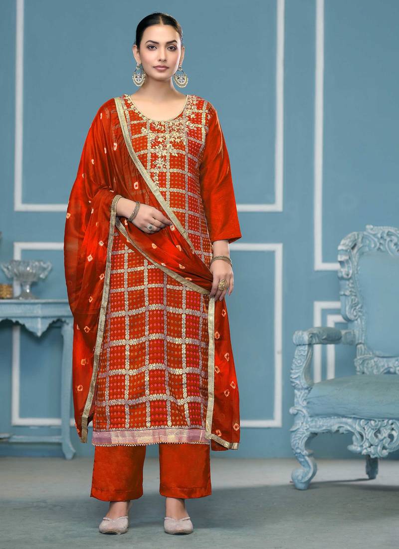 Orange woven cotton silk semi stitched churidar dress-materials
