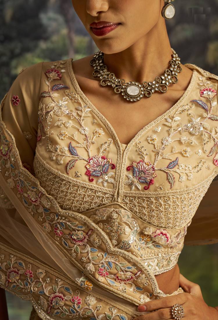 cream net embroidered lehenga choli with dupatta
