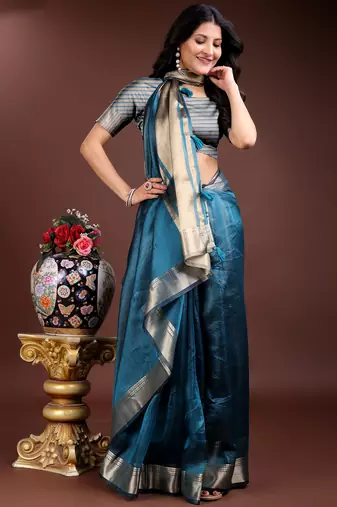 Blue color solid zari border plain orgenza saree