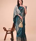 turquoise color woven work lichi art silk blend saree