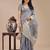 sky blue color checks solid zari border orgenza saree