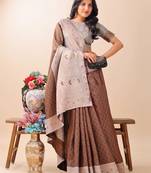 brown color woven work lichi art silk blend saree