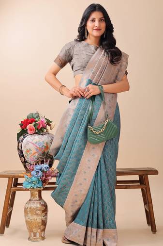 teal color woven work lichi art silk blend saree
