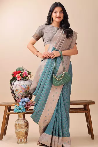 teal color woven work lichi art silk blend saree