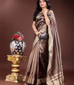 brown color solid zari border plain orgenza saree