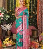 sea green color woven work art silk wedding wear saree