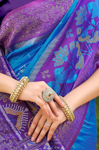 blue color woven work pochampally art silk blend saree