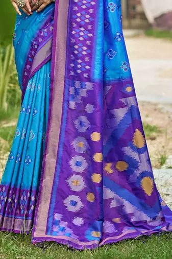 blue color woven work pochampally art silk blend saree