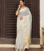 Cream color solid plain cotton saree