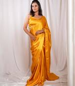 Yellow cutdana border satin embroidered saree with stitched blouse