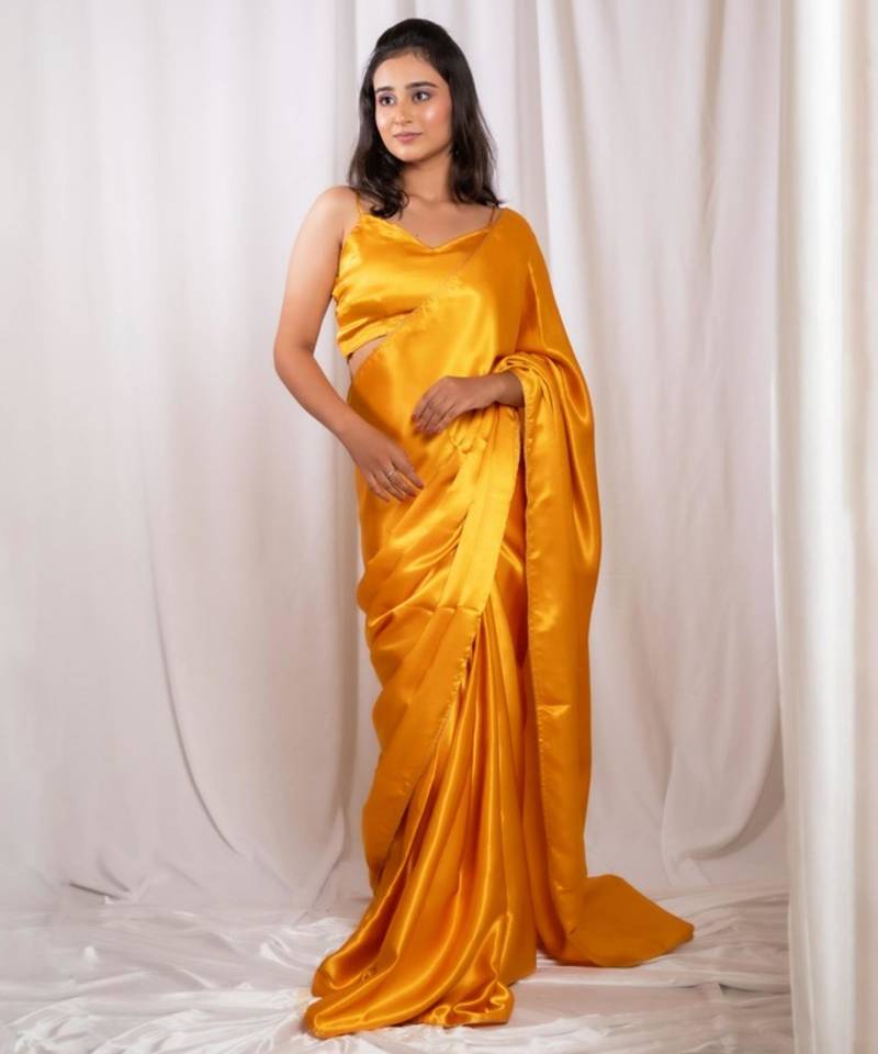 Yellow cutdana border satin embroidered saree with stitched blouse