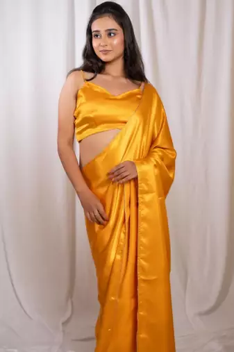 yellow cutdana border satin embroidered saree with stitched blouse