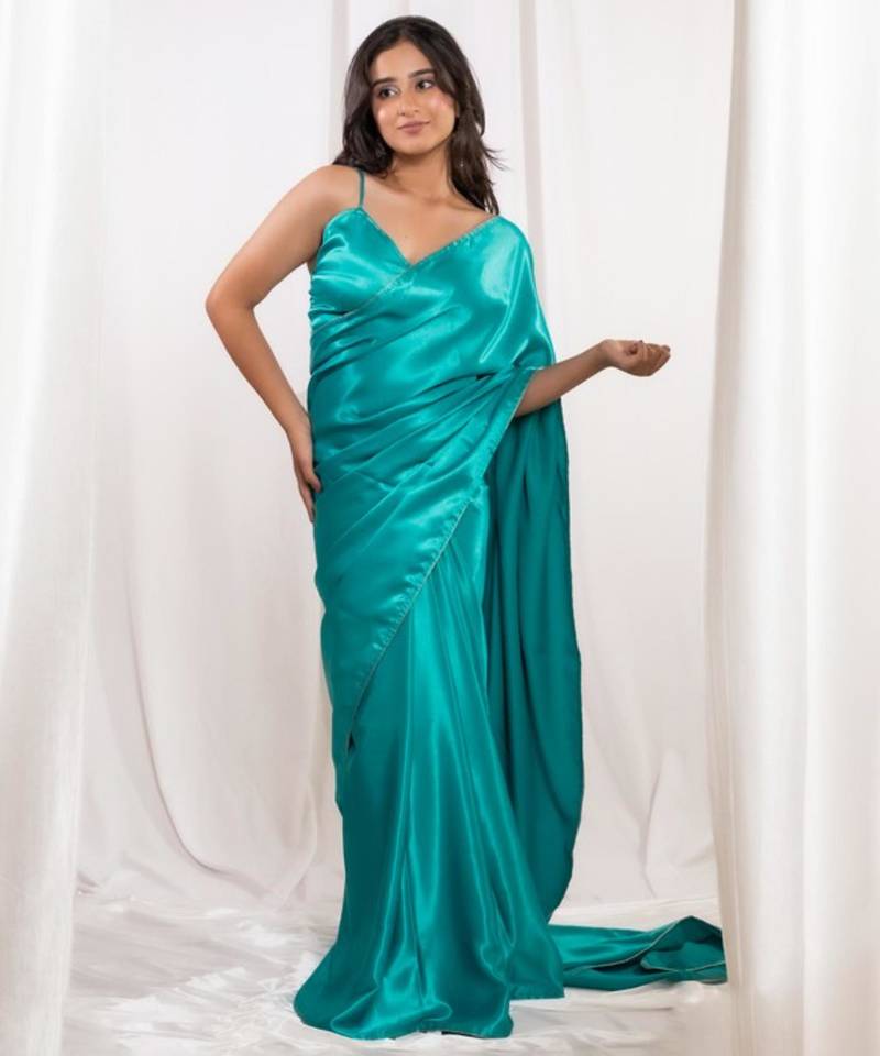 Aqua green cutdana border satin embroidered saree with stitched blouse
