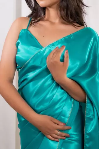 aqua green cutdana border satin embroidered saree with stitched blouse