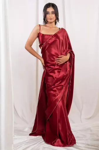 Red cutdana border satin embroidered saree with stitched blouse