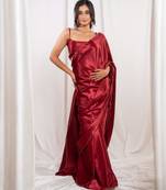 Red cutdana border satin embroidered saree with stitched blouse