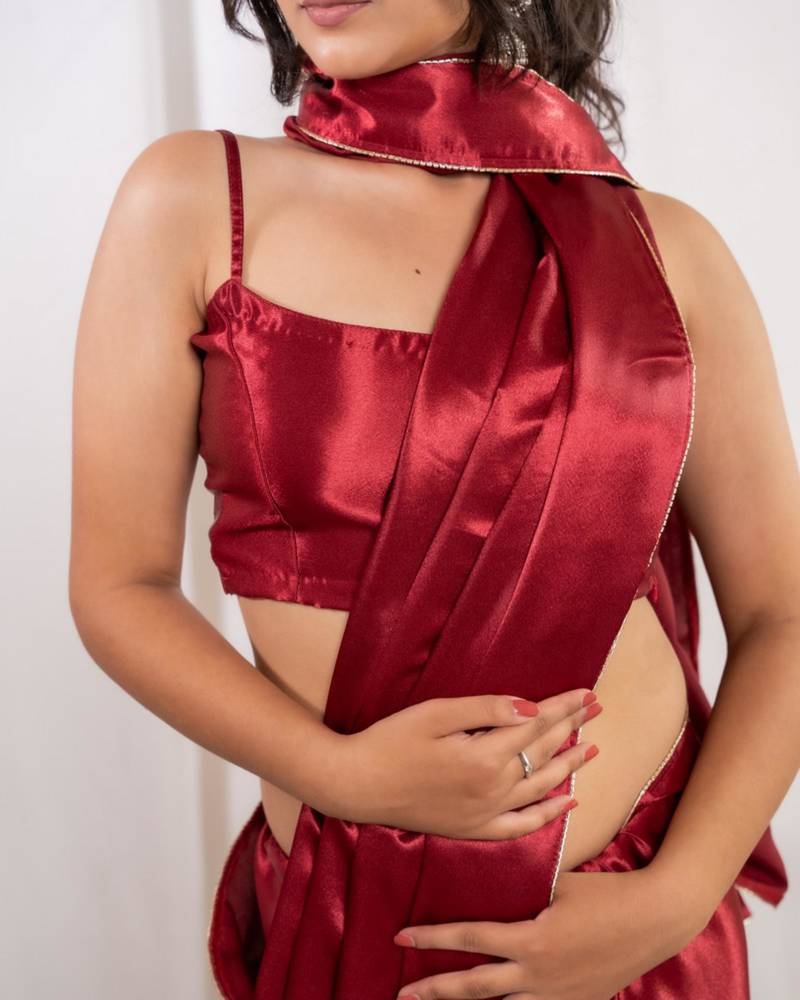 Red cutdana border satin embroidered saree with stitched blouse