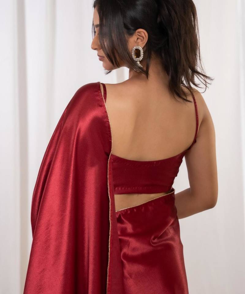 Red cutdana border satin embroidered saree with stitched blouse