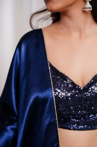 Midnight muse navy blue cutdana border satin embroidered saree with stitched sequin blouse