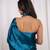 Teal blue cutdana border satin embroidered saree with stitched blouse