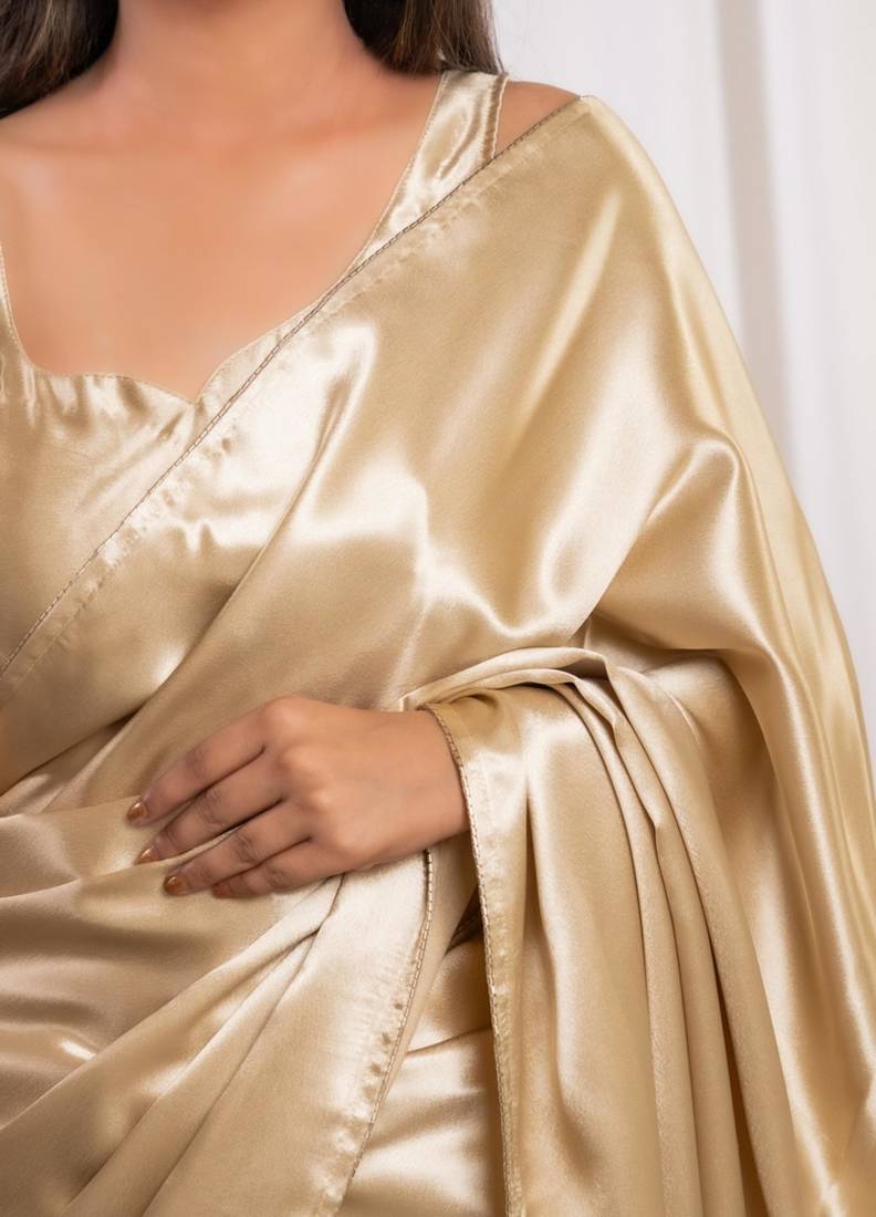 Golden cutdana border satin embroidered saree with stitched blouse