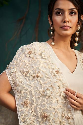White embroidered satin dress with cape