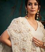 White embroidered satin dress with cape