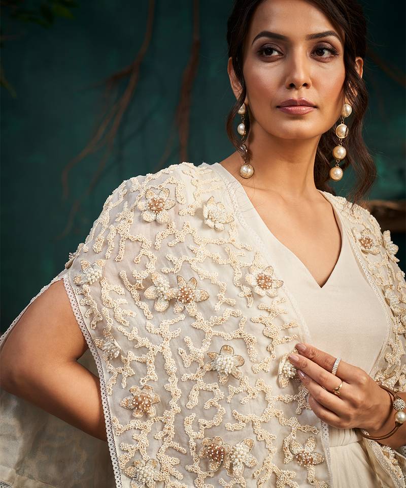 White embroidered satin dress with cape