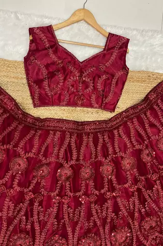 Maroon embroidered soft net lehenga choli with dupatta