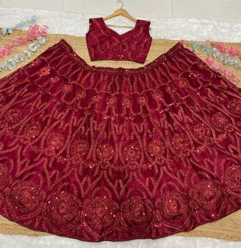 Maroon embroidered soft net lehenga choli with dupatta 4